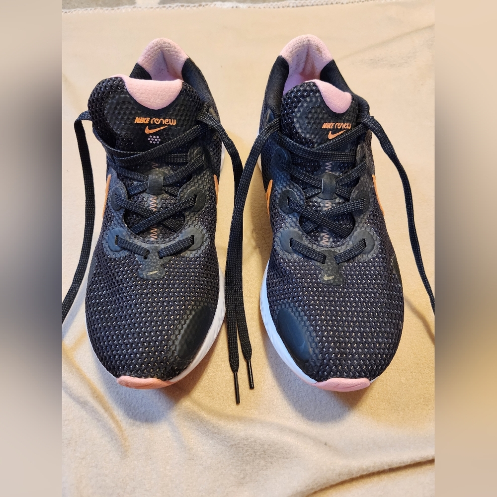 Nike Renew Run Black and Pink with Hint of Orange. Women's size 10 Running Shoes